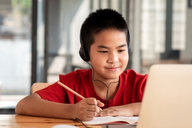student working on a laptop